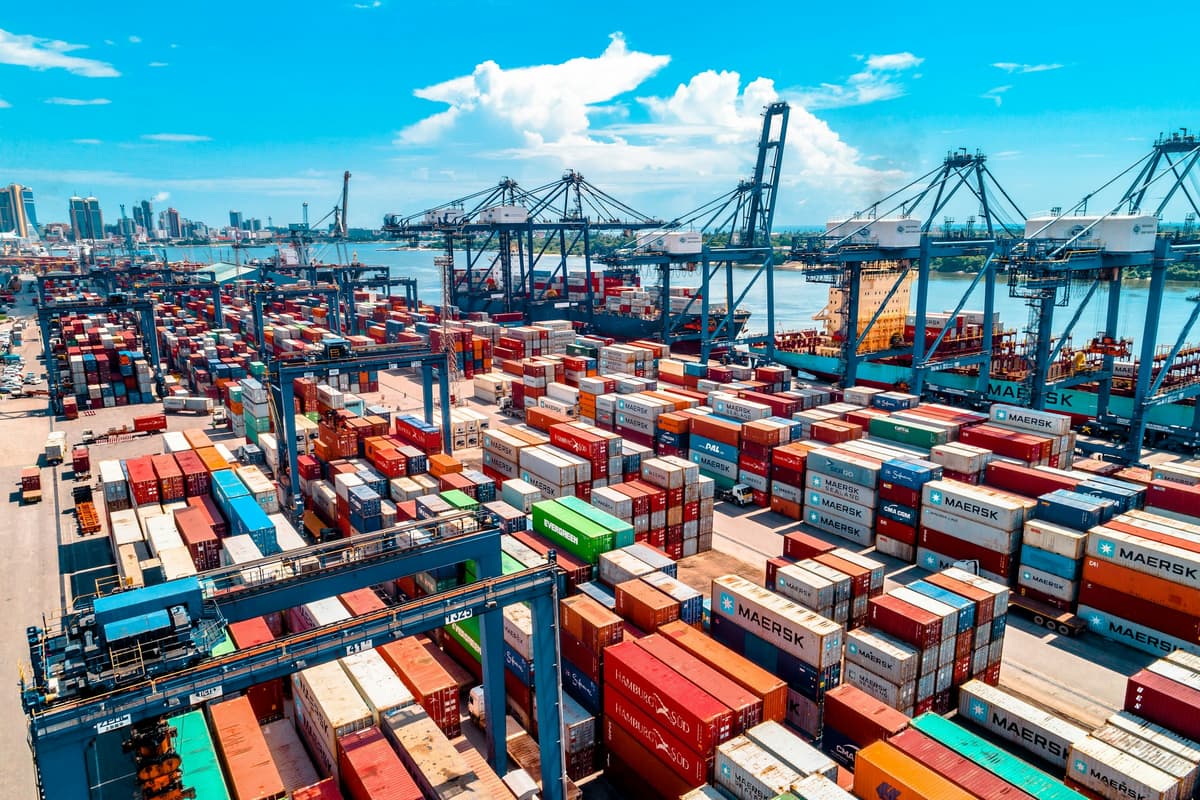 Container terminal with stacked containers and ship-to-shore cranes